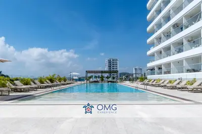 a swimming pool in the middle of a building at Vista increíble + balcón soñado cerca del mar CB942 in Cartagena de Indias