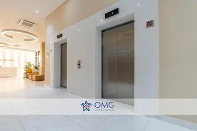 a lobby of an office building with a elevator at CB 1002 | Suite moderna con vista al mar infinita in Cartagena de Indias