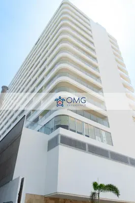 a building with the one singapore logo on it at Despierta frente al mar mágicos atardeceres piso 15 CB1505 in Cartagena de Indias