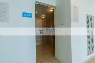an entrance to a building with a sign on the door at CB1531 | Confort premium: cama King y balcón in Cartagena de Indias