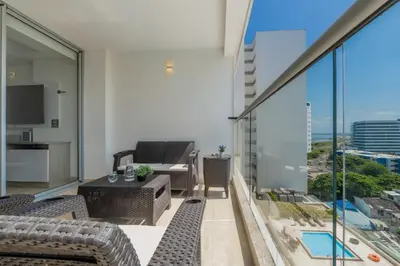 an apartment balcony with a view of the city at CB937 | Stylish loft piso 9 con balcón y vista ciudad in Cartagena de Indias