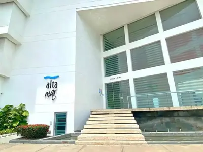 a white building with stairs in front of it at Apartamento Boutique - Cartagena in Cartagena de Indias