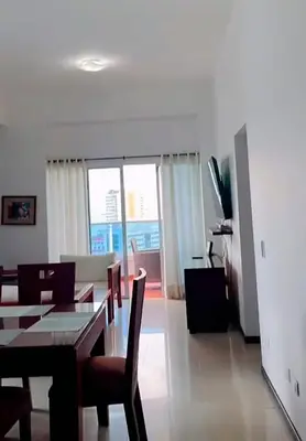 a dining room with a table and chairs in a living room at Mirador del Laguito 13003 in Cartagena de Indias