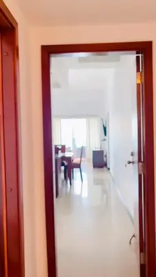 a room with a table and a dining room at Mirador del Laguito 13003 in Cartagena de Indias