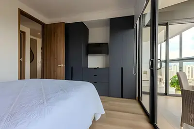 a bedroom with a white bed and a window at Luxury Exlusive Panoramic View & Historic Center in Cartagena de Indias