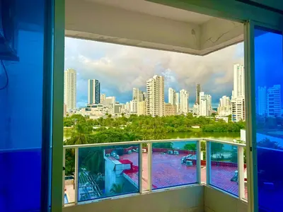 a view of a city skyline from a window at 1C-AL2J APARTAMENTO DE 1 ALCOBA CERCA AL MAR CON AIRE ACONDICIONADO PISCINA Y WIFi in Cartagena de Indias