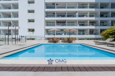 a swimming pool in front of a apartment building at Suite piso 12 con vista mágica Ciudad CB1241 in Cartagena de Indias