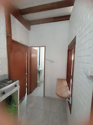a kitchen with a sink and a stove in a room at Hostal playa descalzo in La Boquilla