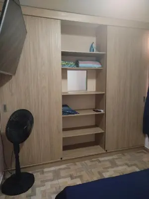 a closet with a fan in a room at La casita de jo in Cartagena de Indias