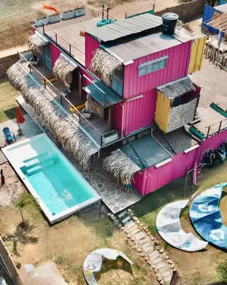 an overhead view of a house with a swimming pool at Love en Mojarra Beach Habitación privada vista al mar in Salina de Rey