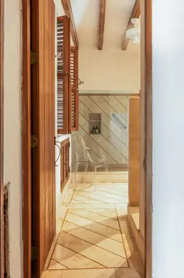 an open door to a room with a chair at Casa Trujillo in Cartagena de Indias
