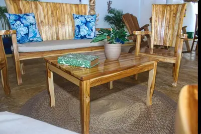 a living room with a couch and a coffee table at Chalet Ledymar in Cartagena de Indias