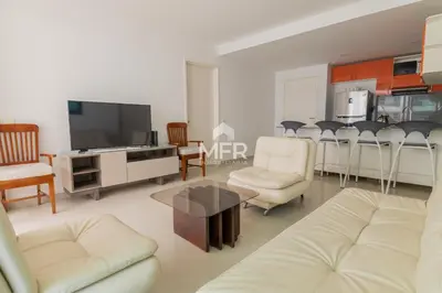 a living room with a couch and a table at Morros Epic 2 Bedrooms Beachfront by Inmobiliaria MFR in Cartagena de Indias