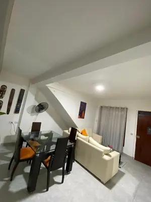 a living room with a couch and a table at Casa lo amador alojamiento entero in Cartagena de Indias