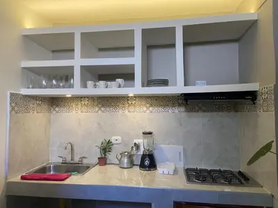a kitchen with a sink and a counter top at Casa lo amador alojamiento entero in Cartagena de Indias