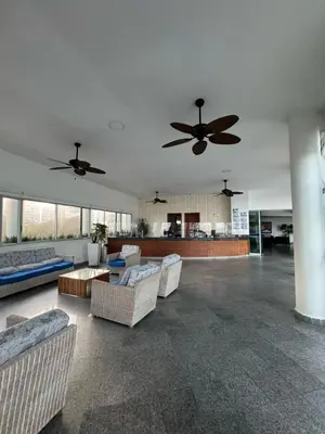 a large living room with two ceiling fans and couches at Apartamento con vista al mar Palmetto in Cartagena de Indias