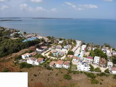 an aerial view of a resort by the water at Cabaña doña Santi in San Antero