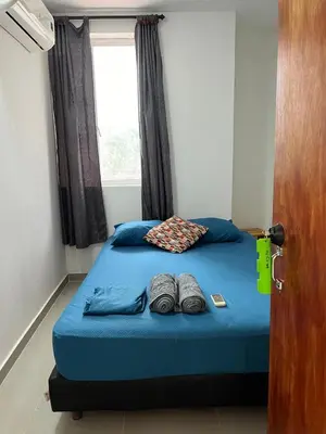 a bed with two pairs of underwear sitting on it at Habitación cerca de la playa 201 in Cartagena de Indias