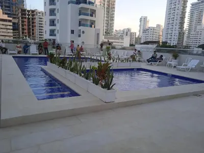 a swimming pool on the roof of a building at Bocagrande cerca del mar in Cartagena de Indias
