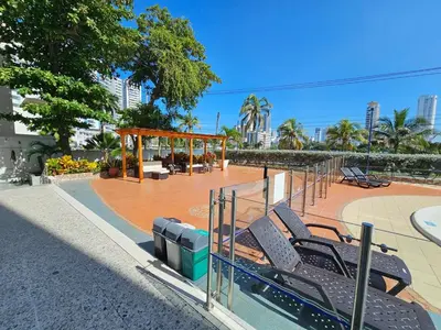 a group of chairs sitting on a patio at Vacation Home with water views in every room! in Cartagena de Indias
