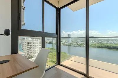 an office with a table and chairs and a large window at Lujoso y Nuevo Cerca al Centro/ Piscina Panorámica in Cartagena de Indias