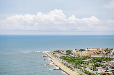 an aerial view of the beach and the ocean at Luxury apt sea front AC Wifi pool at cartagena in Cartagena de Indias