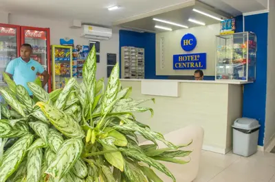a man in a grocery store with a plant at Hotel Central in Sincelejo