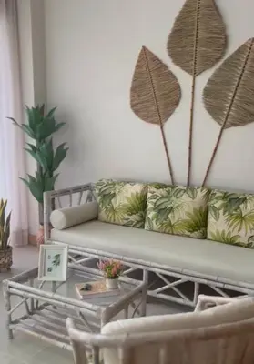 a living room with a couch and a table at Apartamento de lujo para estrenar en Morros Cartagena in Cartagena de Indias