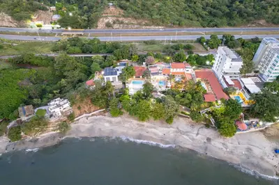 an aerial view of a resort on a beach at Casa de playa vistamare in Santa Marta