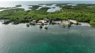 an aerial view of an island in the water at Hotel isla bonita in Tintipan Island