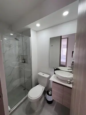 a bathroom with a toilet and a sink and a shower at Apartmento en Ciudad Mallorquín in Puerto Colombia