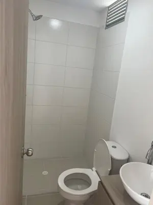 a bathroom with a toilet and a sink at Apartment with large balcony in Cartagena de Indias