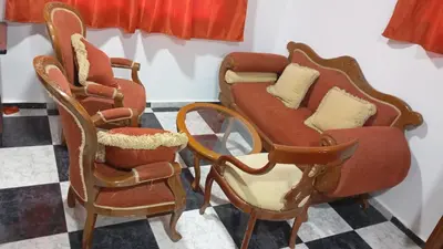 a group of chairs and a couch in a room at Apartamento #6 in Puerto Colombia