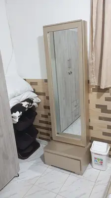 a bathroom with a large mirror on a stand at Apartamento #7 in Puerto Colombia