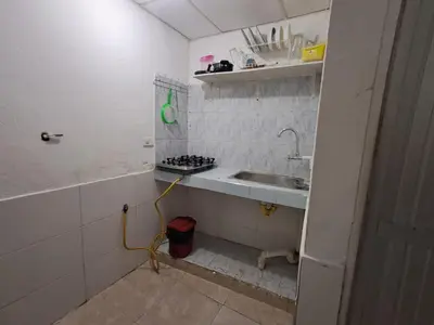a small bathroom with a sink and a sink at Le Petit Apartamento Con Encanto En Cartagena in Cartagena de Indias