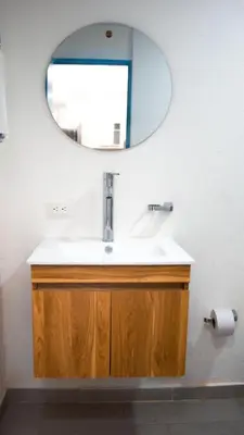 a bathroom with a sink and a mirror at Cabaña Mary Mar en Isla in Cartagena in Isla de Tierra Bomba