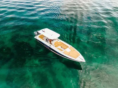 a small boat floating in the water at Lancha Para 14 Personas - Cholon - Islas del Rosario - Cartagena in Cartagena de Indias