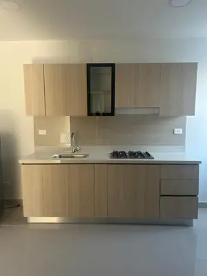 a kitchen with a sink and a stove in it at Aparta suite in Cartagena de Indias