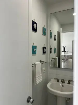 a bathroom with a sink and a mirror at Morros 922 Seaside Retreat in Cartagena de Indias