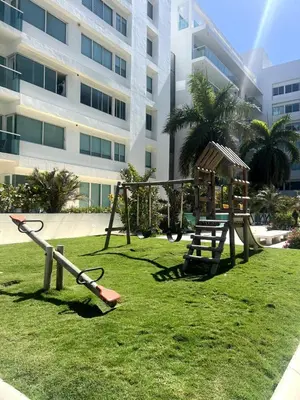 a playground in front of a large building at Morros 922 Seaside Retreat in Cartagena de Indias