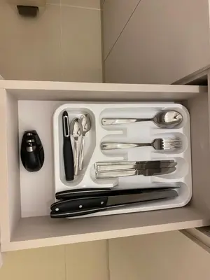 a drawer filled with utensils in a kitchen at Splendid condo with a sea view in Puerto Colombia