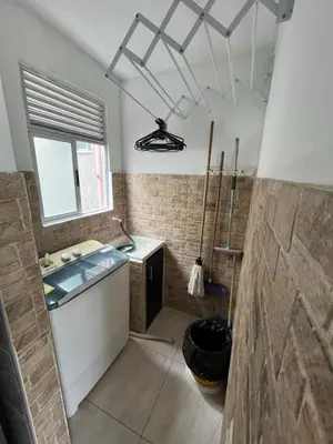 a bathroom with a sink and a shower in it at ruiseñor 1 in Barranquilla