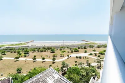 a view of the beach from the balcony of a condo at CB910 | Suite frente al mar diseño moderno balcon in Cartagena de Indias