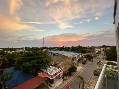 a view of a city street with a cloudy sky at Apartments Tolú 3 habitaciones in Tolú