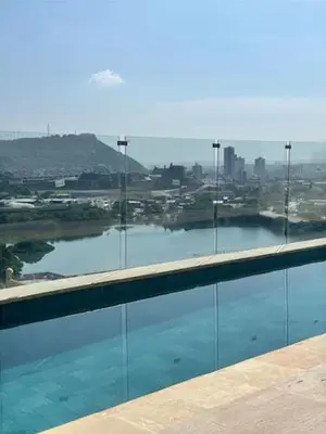 a swimming pool with a view of a body of water at THE LOFT 405 in San Basilio - La Matuna - Cartagena in Cartagena de Indias