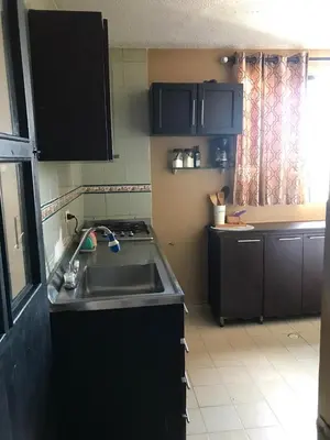 a kitchen with a sink and a counter top at Apartamento Carnavalero calle 72, ubicación privilegiada eventos de carnaval zona norte in Barranquilla