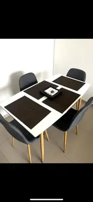 a black and white table with two chairs at Barranquilla Carnival 4 PX in Barranquilla
