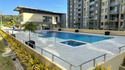 a swimming pool on the side of a building at Norte de Barranquilla in Barranquilla