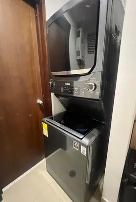 a microwave oven sitting on top of a machine at Luxury, Central y Exclusivo1 Linea Playa Privada in Cartagena de Indias