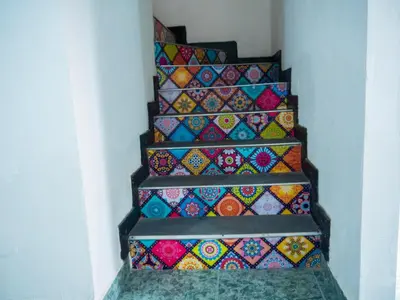 a set of stairs with colorful tiles on them at Lovely and close to airport, sea, and old town in Cartagena de Indias